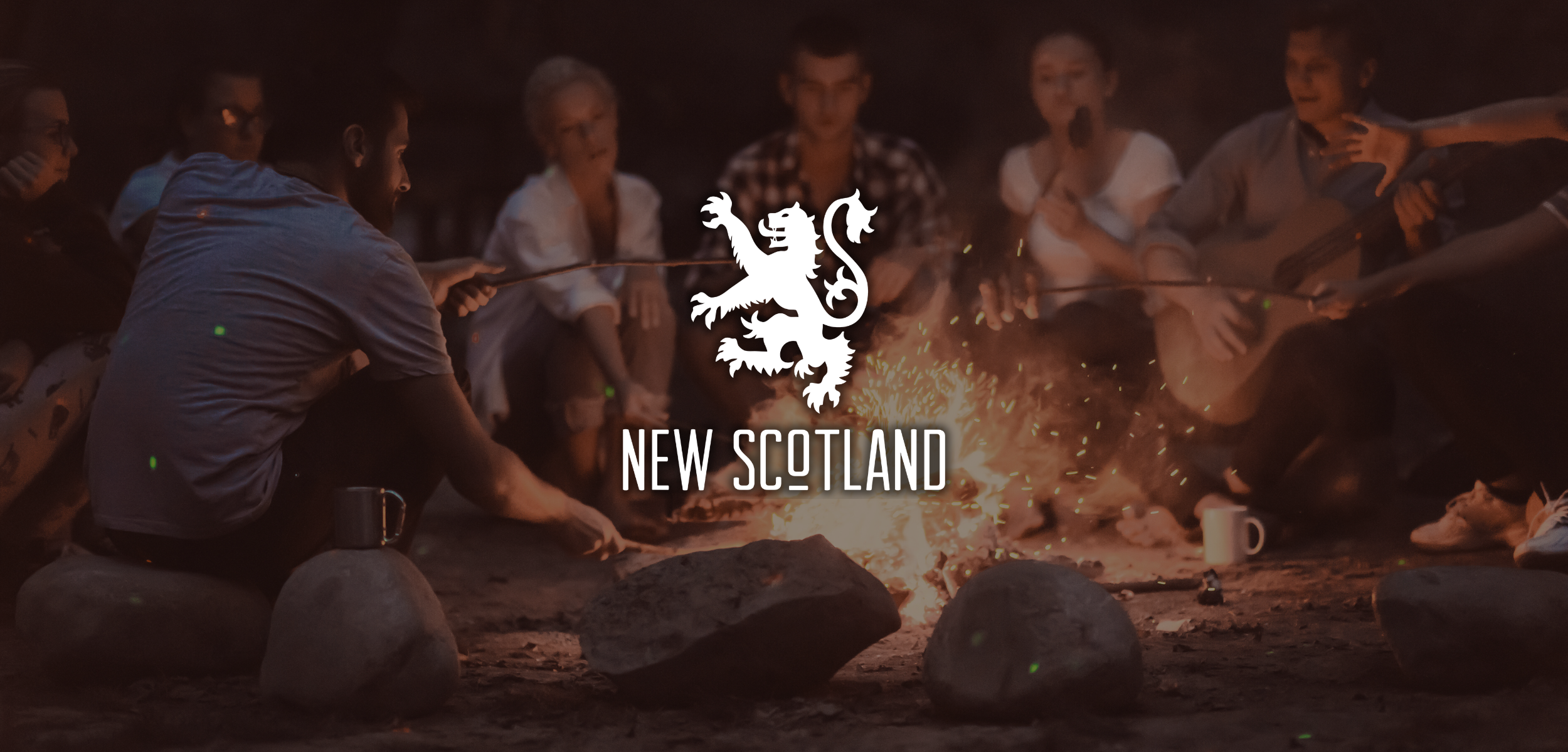 <img src="your-image.webp" alt="Group of friends sitting around a campfire with New Scotland Clothing Co. logo overlay" />
